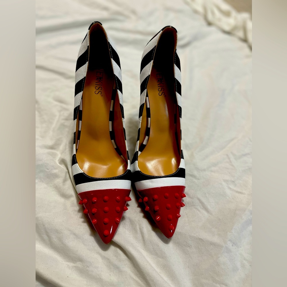 Women’s stylish pumps. Brand new, red spike and zebra.